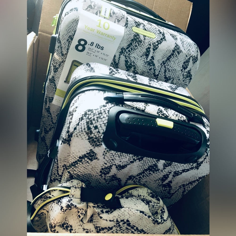 Aimee Kestenberg Sky High Snake print luggage set